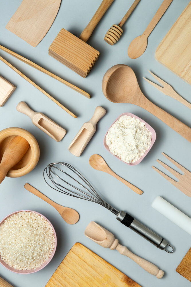 flat lay wooden kitchen tools arrangement e1697725172747